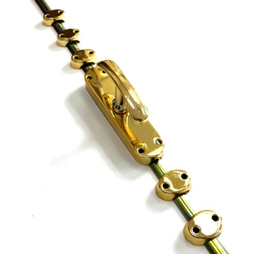 FALLEBA PARA PUERTAS VENTANAS TIPO CRUZ  DORADA